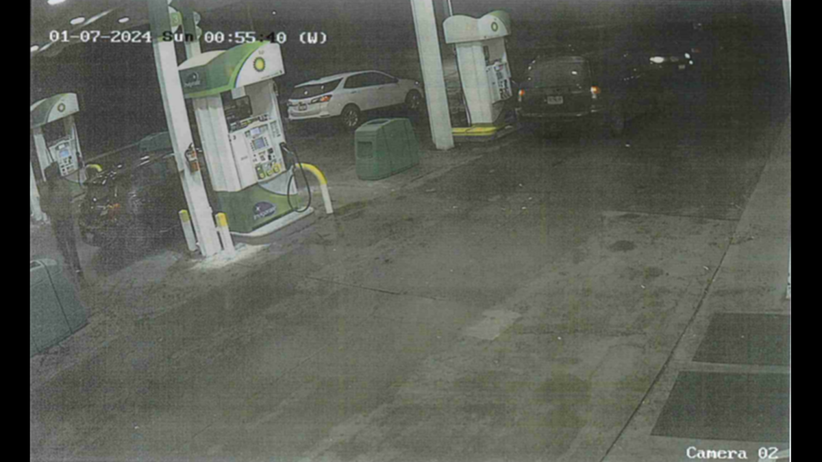 Video surveillance at a gas station off East 63rd and Prospect shows a white SUV that police identified to be involved in the January shooting death of Kansas City businessman John Bartrom.