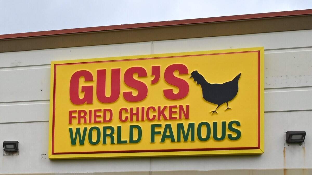 A file photos shows the sign for Gus’s World Famous Fried Chicken.