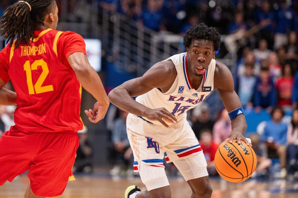 Kansas Jayhawks guard Melvin Council Jr. drives the ball downhill in the Jayhawks exhibition game vs. Pittsburg State Gorillas, on Friday, October 16, 2026, at Allen Fieldhouse. The exhibition game, a first for Late Night in the Phog, replaces the normal format of variety show style sketches and a team scrimmage.