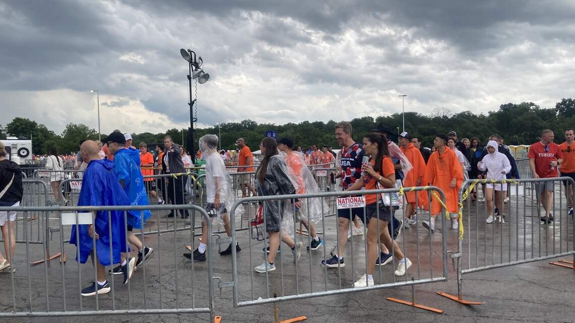 Fans arriving for World Cup in rain told they can’t leave buses, can’t enter stadium