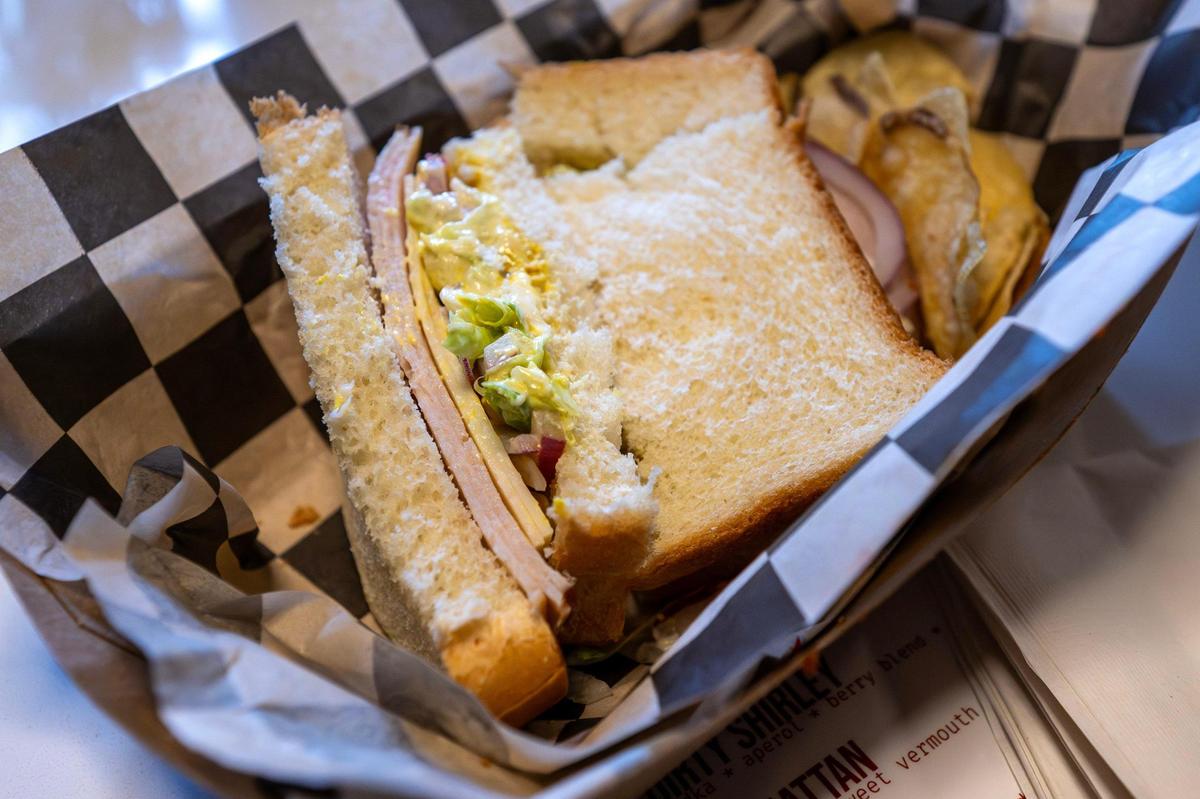 A turkey sandwich sack lunch is served at Something Good on Wednesday, July 16, Kansas City. It features Swiss cheese, lettuce, tomato, red onion, mayo, mustard and white bread.