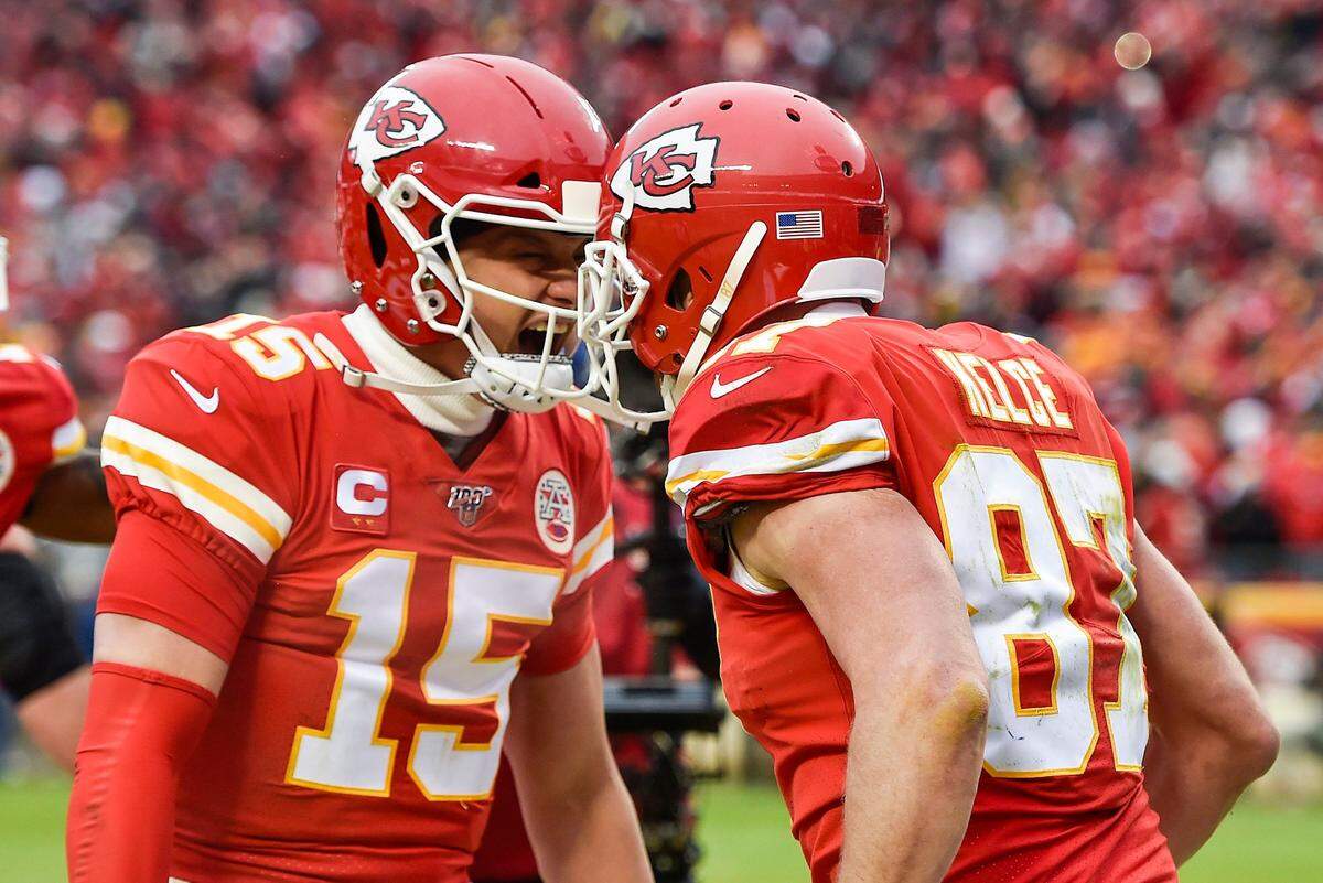 Kansas City Chiefs quarterback Patrick Mahomes and tight end Travis Kelce celebrated after Kelce scored a second touchdown in the second quarter against the Texans.