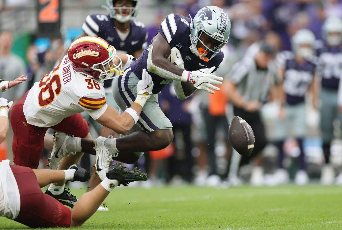 Kansas State running back Joe Jackson fumbles the ball during the Aer Lingus Classic between Iowa State and Kansas State at Aviva Stadium in Dublin on Aug. 23, 2025.