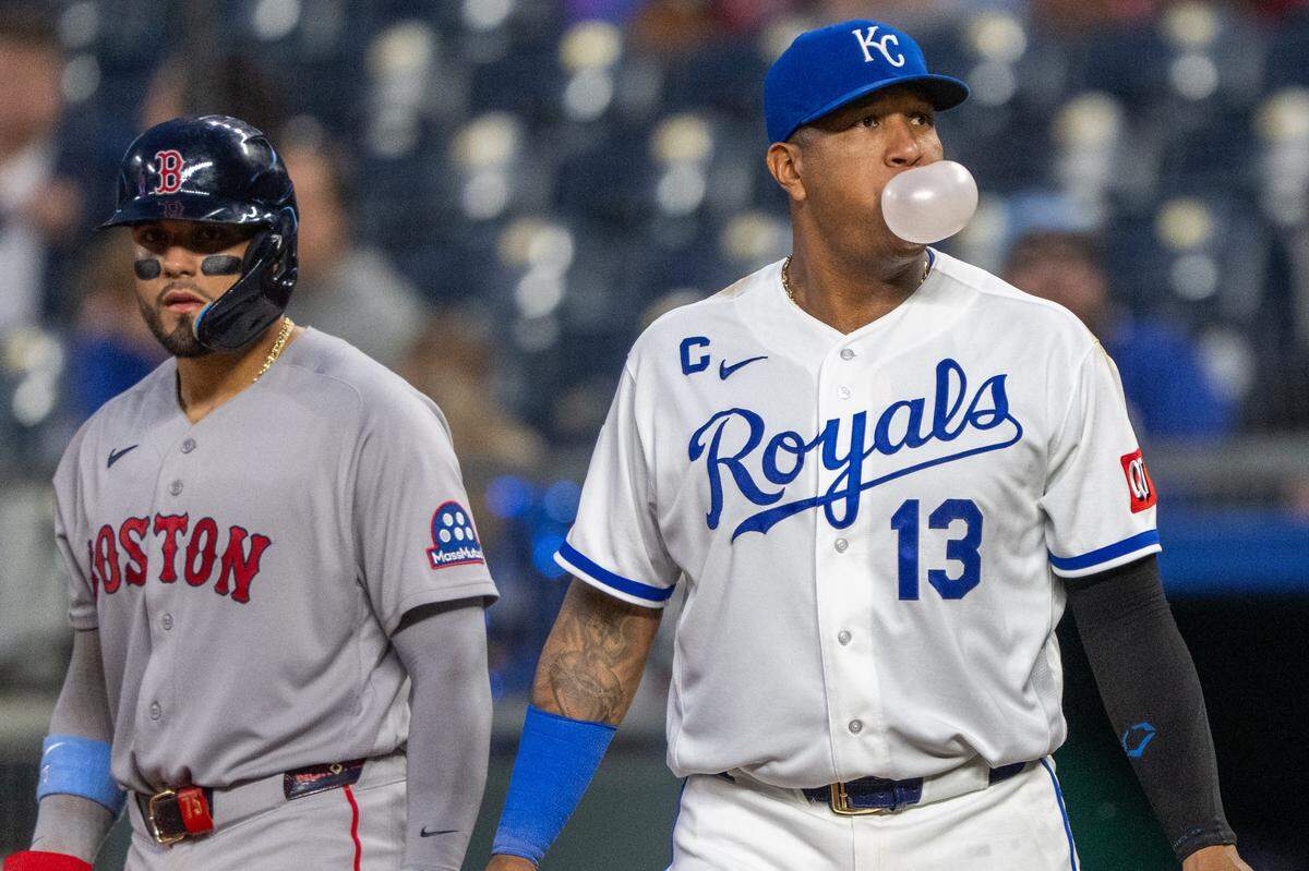 Kansas City Royals catcher Salvador Perez (13) blows a bubble between pitches during a game against the Boston Red Sox on Wednesday, May 20, 2026, at Kauffman Stadium.