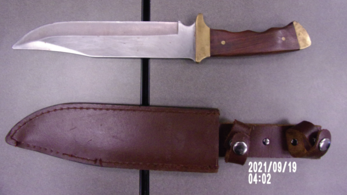 A haunted house actor swapped out his fake knife prop for this real bowie knife, police said.