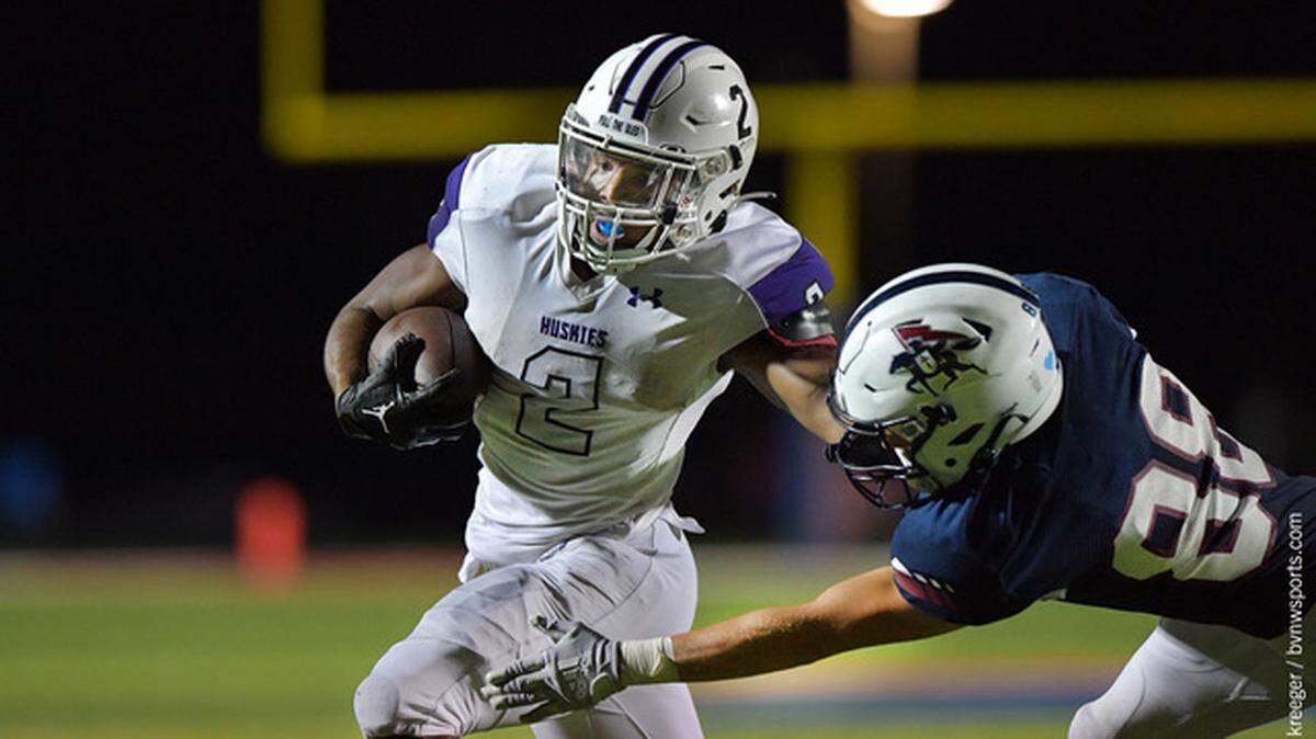 Blue Valley Northwest running back Grant Stubblefield rumbles for yardage during an early-season game against St. James.