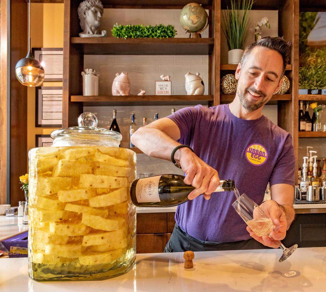 Tony Witt prepares a Labella Prosecco at the Urban Egg bar.