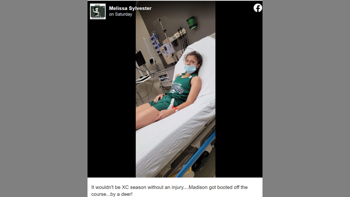 An eighth grade girl was run into and injured by a deer during a cross country meet in Michigan.