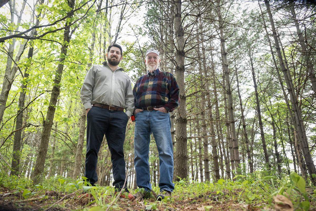 Brian Weinberg, left, director of the Foundation for Regeneration, and Bob Berkebile, the Kansas City-based architect behind the Heart Forest project, are seen during a tour of the eight-acre heart-shaped forest on Wednesday, May 6, 2026, in Kansas City. The organizers and volunteers are in the process of rejuvenating the forest with trails, seating and signage, ahead of the World Cup.