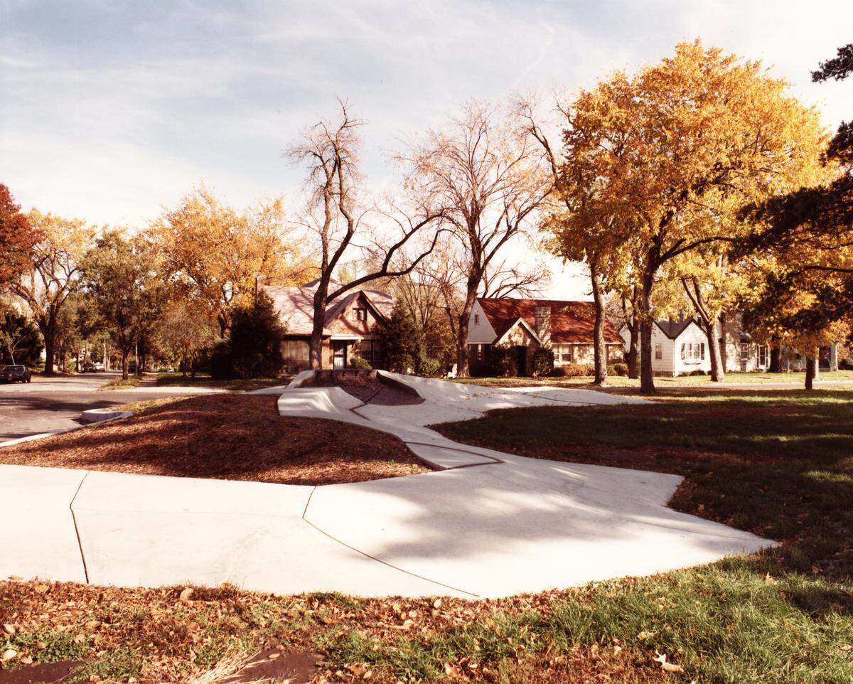 The concreate and brick 49/63 Neighborhood Fountain in 1984.