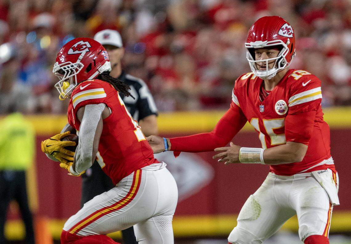 Kansas City Chiefs quarterback Patrick Mahomes (15) hands off to Kansas City Chiefs running back Isiah Pacheco (10) at GEHA Field at Arrowhead Stadium in the first half against the Detroit Lions on Sunday, October 12, 2025, in Kansas City.