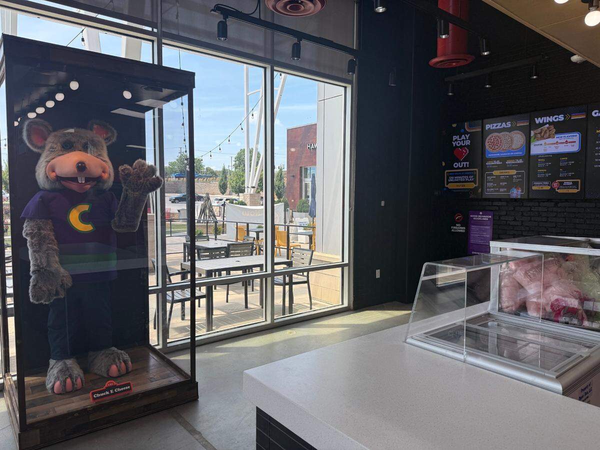 A Chuck E. Cheese animatronic is at the new Chuck’s Arcade.