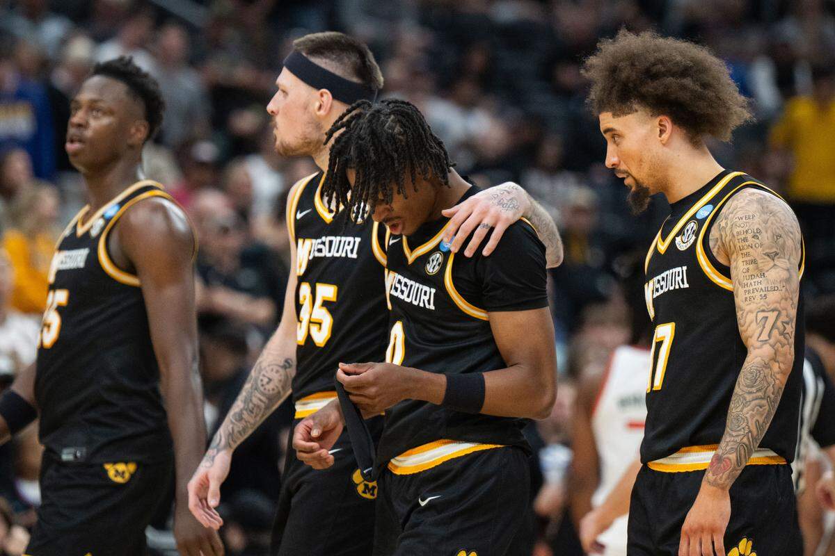 The Missouri Tigers walks towards the bench in the second half of the Tigers first-round NCAA Tournament matchup vs. the Miami Hurricanes at Enterprise Center in St. Louis on Friday, March 20, 2026.