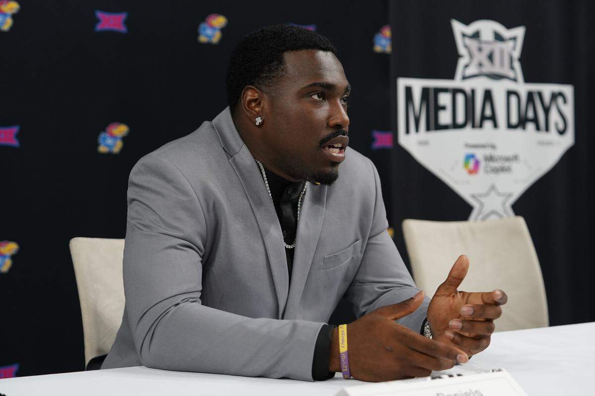 Jul 9, 2025; Frisco, TX, USA; Kansas quarterback Jalon Daniels speaks with the media during 2025 Big 12 Football Media Days at The Star. 