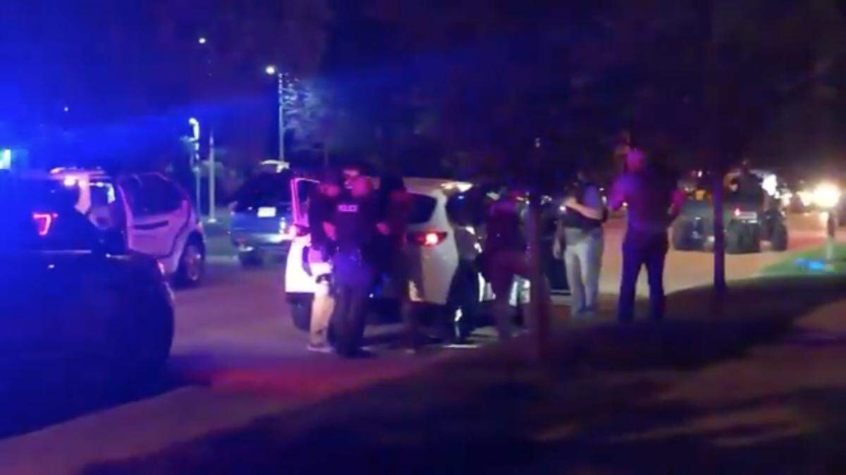 Police detained several people near an area where a shooting Sunday night left one person with life-threatening injuries.