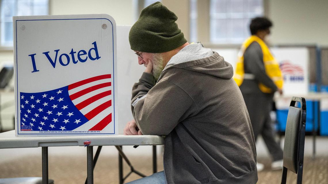 Gaylan Martin of Kansas City looked over the ballot Tuesday, April 2, 2024, at the polling place at Wornall Road Baptist Church in Kansas City. Jackson County voters went to the polls to decide on many races but most notably Question 1, which would authorize tax funding to help pay for a new Royals stadium in the Crossroads and renovations to Arrowhead Stadium.