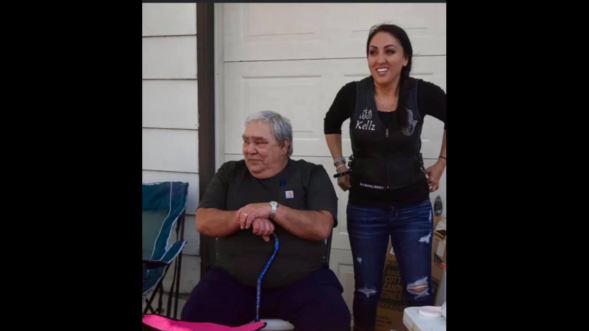Douglas Menser, 66, left, sits beside his daughter Kelly Strother. Menser was fatally shot inside his Kansas City home in Ruskin Heights on Jan. 19. He was remembered as a father of three who was friendly and well-known in the neighborhood, according to family.