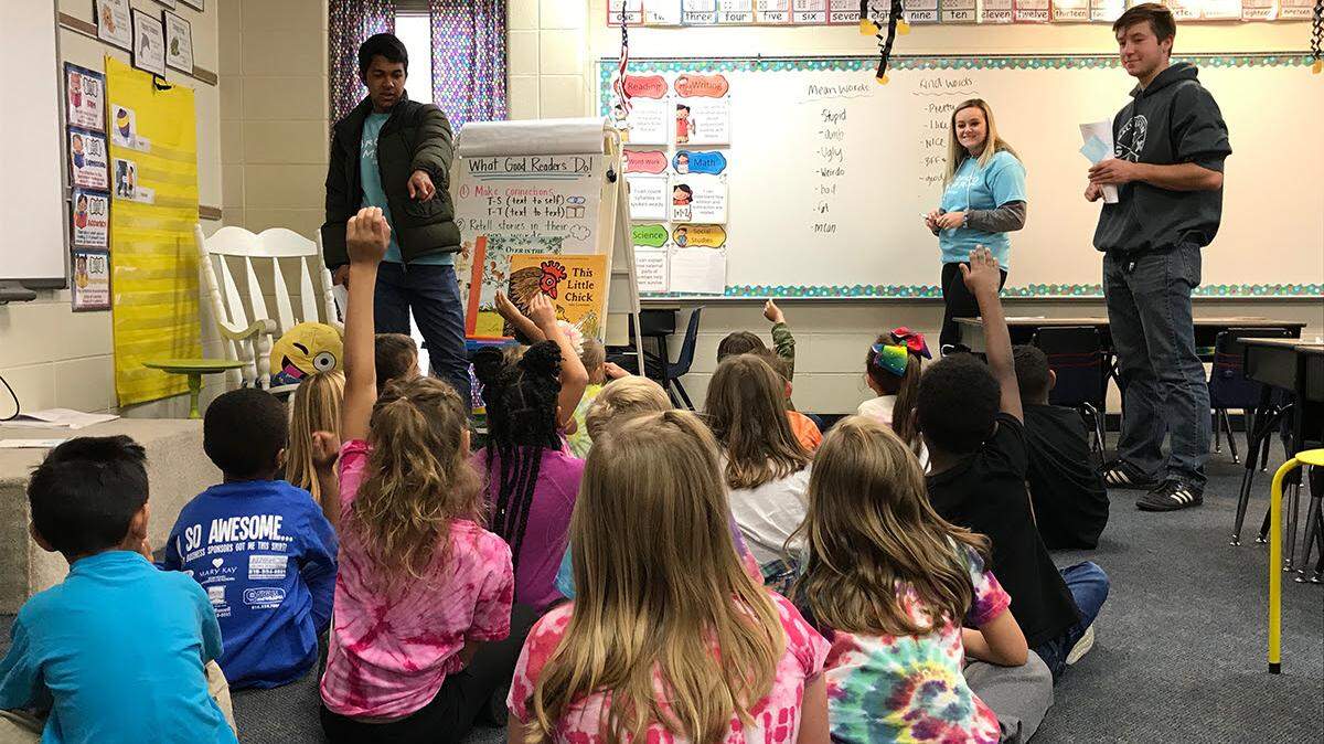 Bronco SMART members talk with elementary students about avoiding harmful substances like illicit drugs and alcohol.