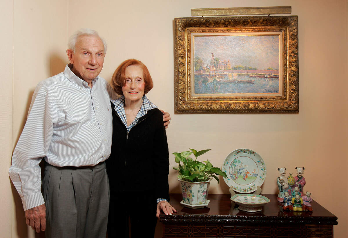 In 2007, Henry Bloch and his wife, Marion, stood in their Mission Hills home next to the painting that he said is his favorite — Alfred Sisley’s “The Locks of Saint-Mammes (L’Ecluse de Saint-Mammes),” 1885. Marion died in 2013, and Henry died in 2019.
