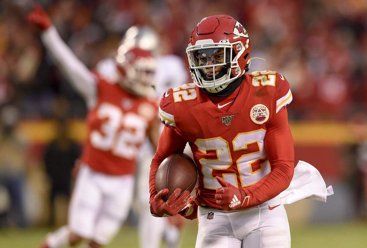 After intercepting the ball, Kansas City Chiefs free safety Juan Thornhill (22) runs for a touchdown during the first half of Sunday’s football game against the Oakland Raiders on December 1, 2019 at Arrowhead Stadium in Kansas City.