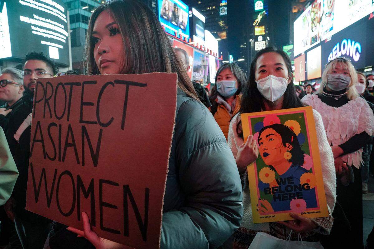 Members and supporters of Asian American and Pacific Islander communities hold a rally, Wednesday March 16, 2022, in New York. A year after the fatal shootings at three Georgia massage businesses, crowds gathered at rallies across the country to remember the victims and denounce anti-Asian violence that has risen sharply in recent years. (AP Photo/Bebeto Matthews)