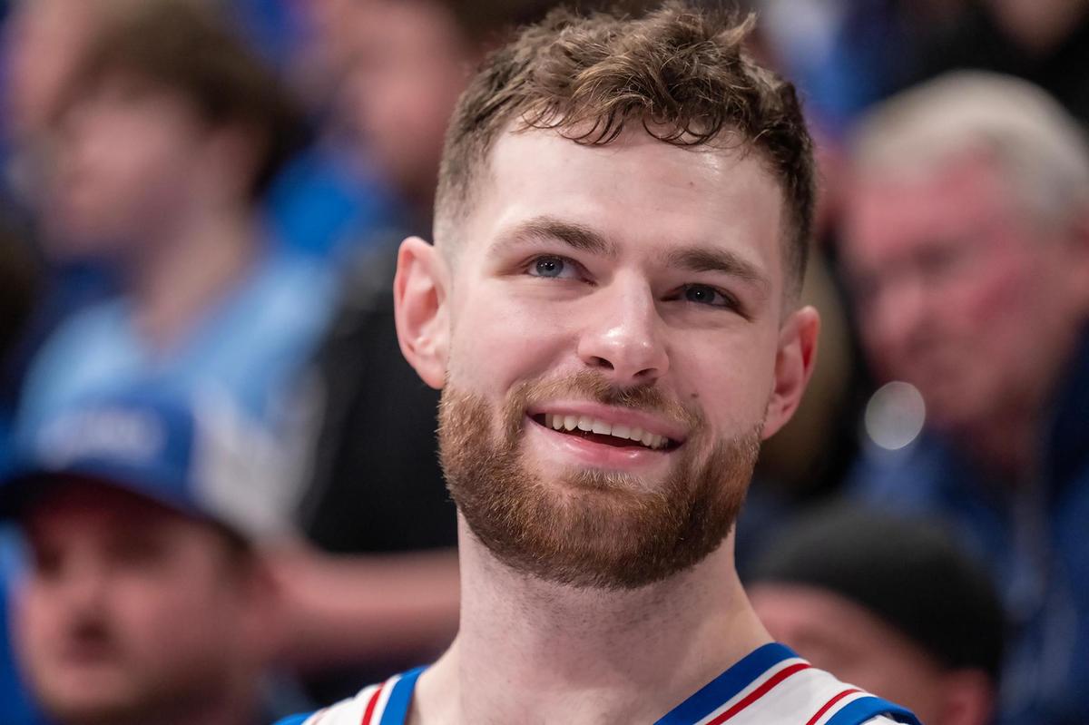 Kansas Jayhawks center Hunter Dickinson (1) was all smiles on the bench as the team closed out a 96-64 win over Oklahoma State at Allen Fieldhouse on Saturday, Feb. 22, 2025, in Lawrence, Kansas.
