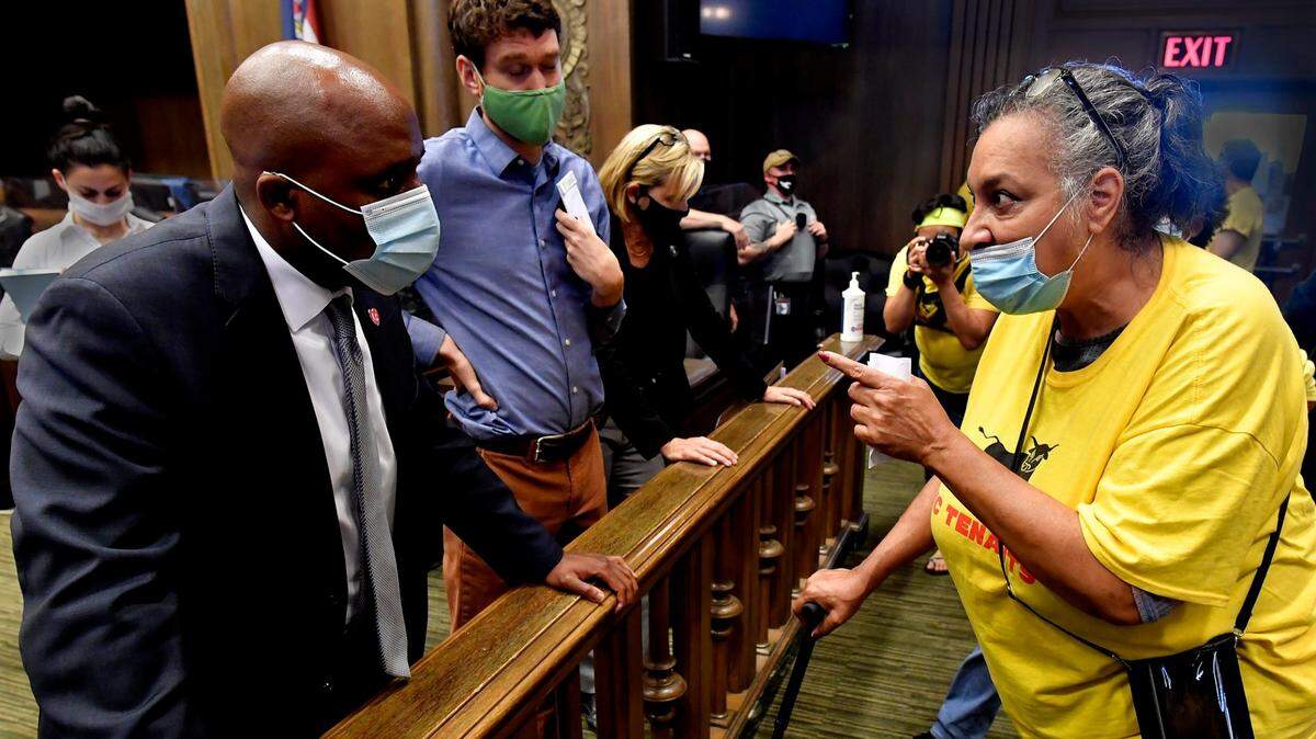Last year, members of KC Tenants, including Sabrina Davis, right, demanded and got a meeting with Kansas City Mayor Quiton Lucas, left, at City Hall. The group was there to protest the mayor’s housing trust fund ordinance.