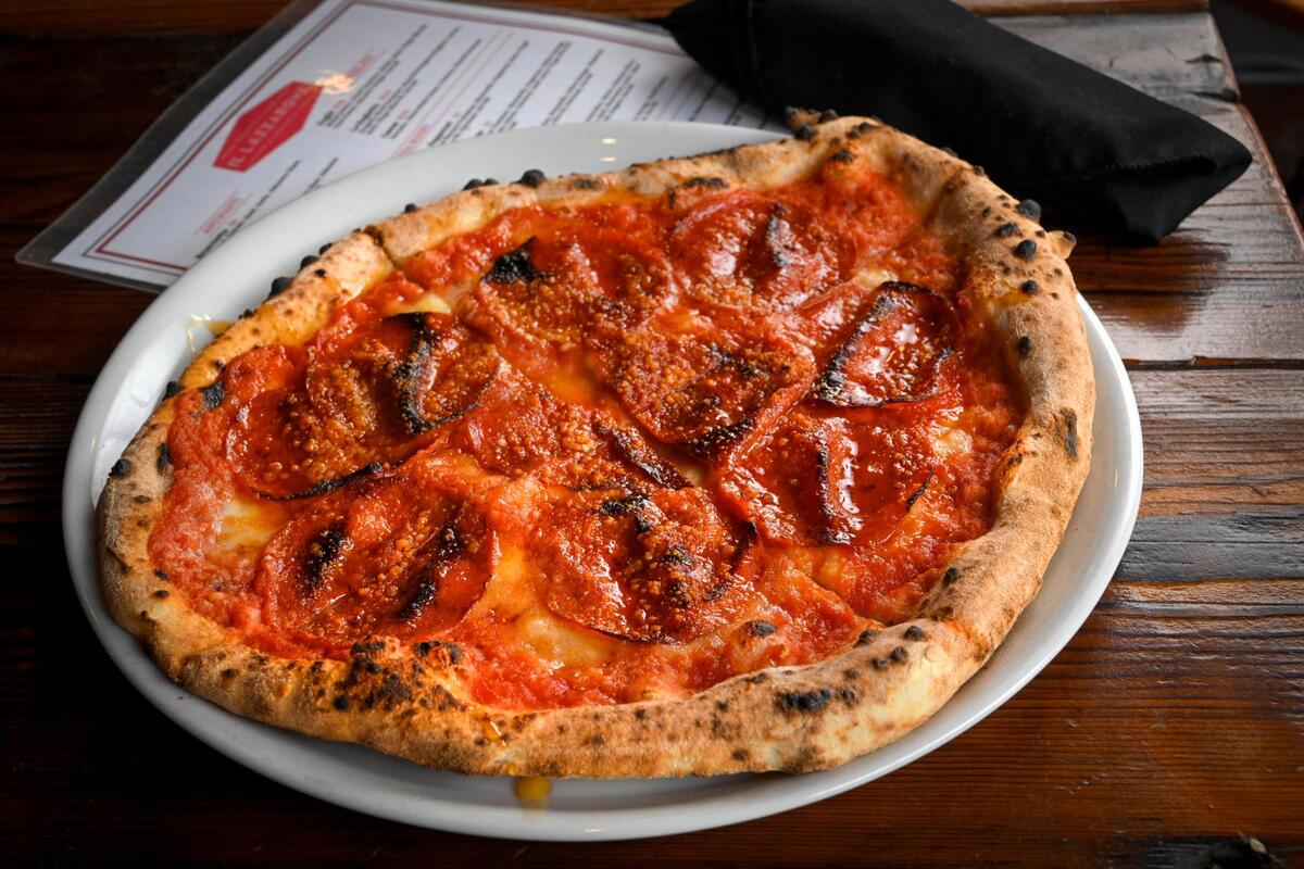 Il Lazzarone’s pepperoni pizza with a drizzle of spicy honey is the go-to order for Chiefs quarterback Patrick Mahomes during training camp in St. Joseph.