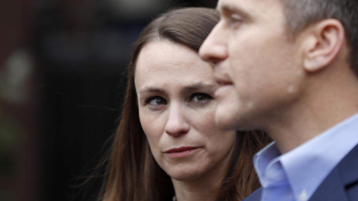 Sheena Greitens, left, listens as her husband, Missouri Gov.-elect Eric Greitens, speaks during a news conference Tuesday, Dec. 6, 2016, in St. Louis.