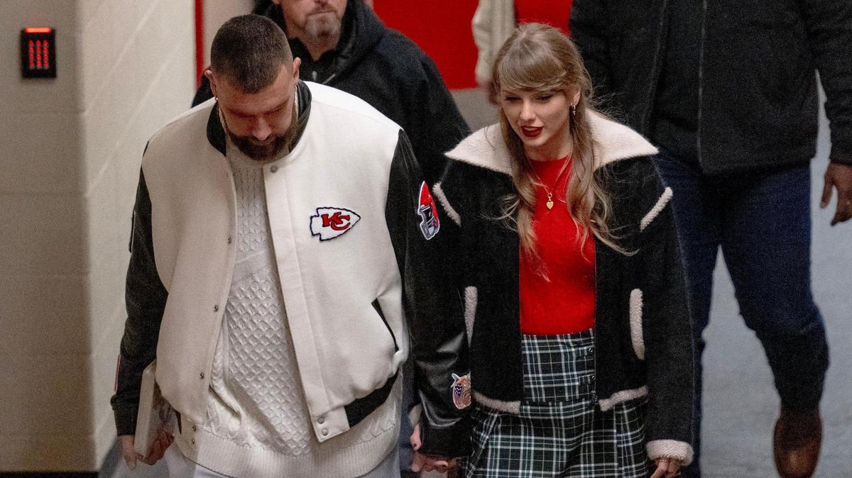 Pop star Taylor Swift holds hands with boyfriend and Kansas City Chiefs tight end Travis Kelce as they leave Arrowhead Stadium after an NFL football game on Monday, Dec. 25, 2023, in Kansas City.