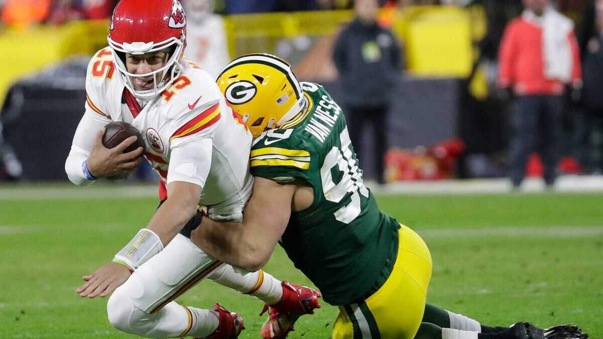 Green Bay Packers linebacker Lukas Van Ness (90) sacks Kansas City Chiefs quarterback Patrick Mahomes (15) during their football game Sunday, December 3, 2023, at Lambeau Field in Green Bay, Wis. Dan Powers/USA TODAY NETWORK-Wisconsin.
