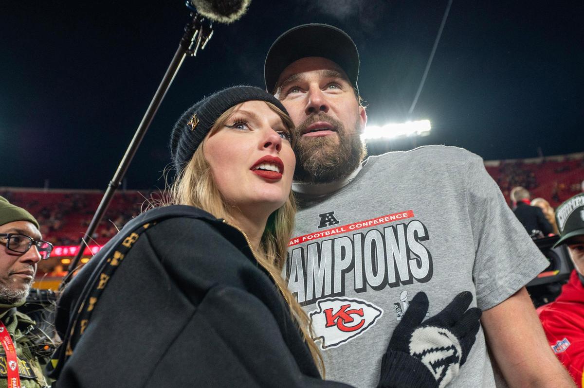 Taylor Swift and Kansas City Chiefs tight end Travis Kelce (87) walk off the field after the trophy ceremony following the Chiefs’ 32-29 victory over the Buffalo Bills in the AFC Championship Game on Sunday, Jan. 26, 2025, at GEHA Field at Arrowhead Stadium.