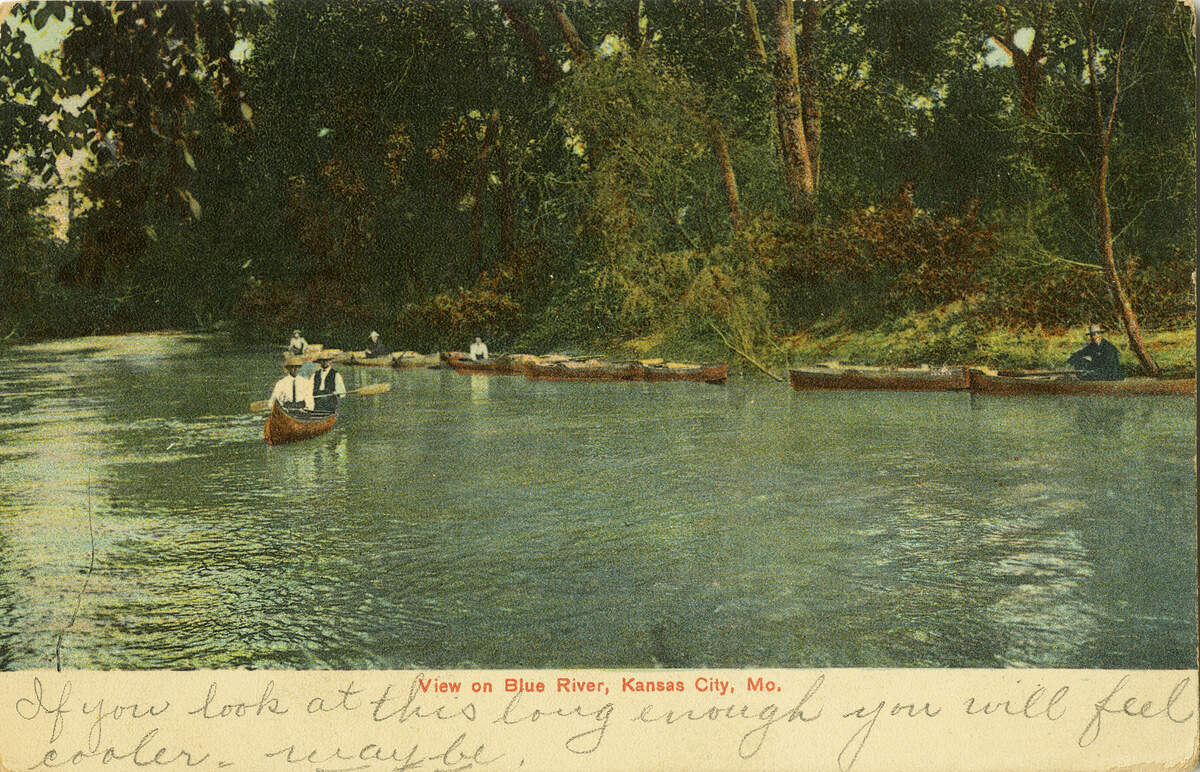 Postcard of canoeists floating the Blue River, dated June 30, 1909.