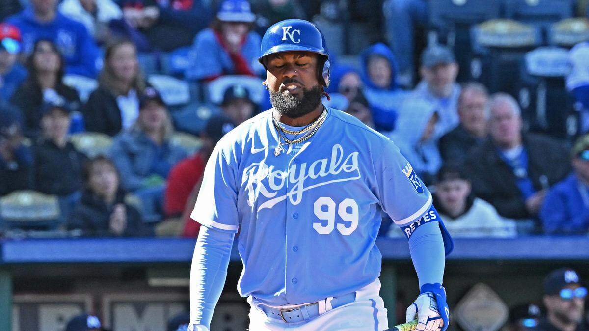 Kansas City Royals designated hitter Franmil Reyes (99) reacts after striking out with the bases loaded to end the third inning against the Minnesota Twins at Kauffman Stadium on April 1, 2023.