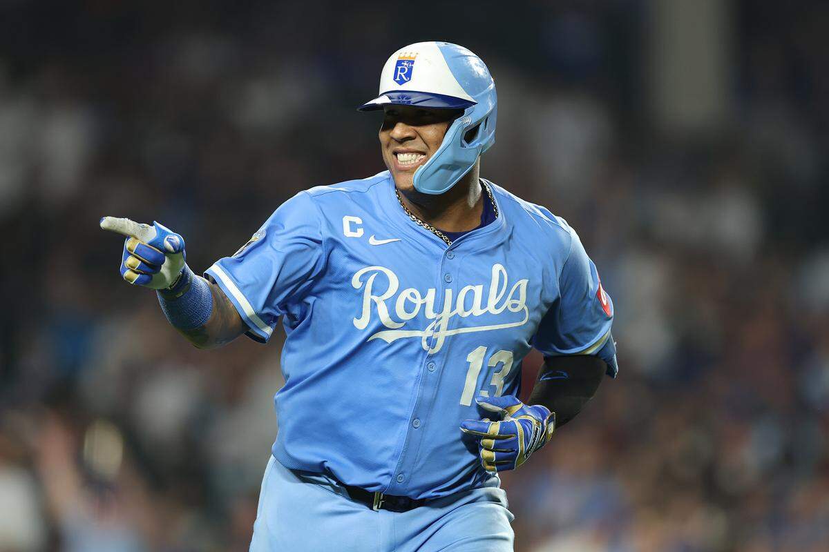 Salvador Perez #13 of the Kansas City Royals celebrates after hitting a two-run home run off Chris Flexen #77 of the Chicago Cubs during the eighth inning at Wrigley Field on July 21, 2025 in Chicago.