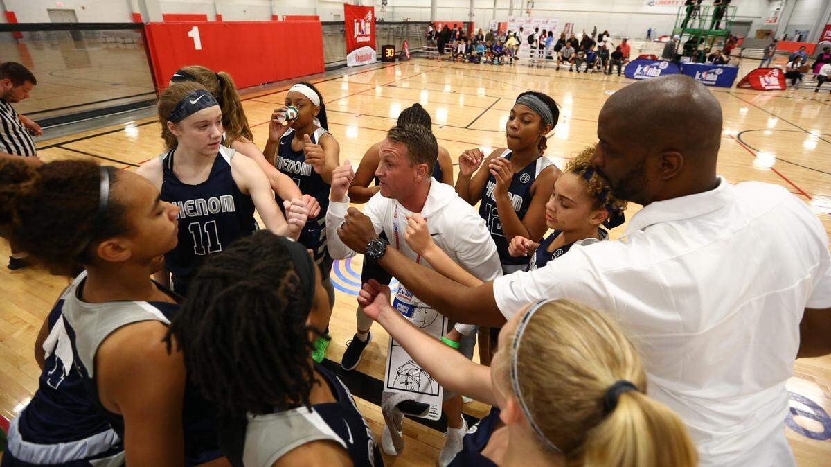 The Missouri Phenom huddled during a game at the Jr. NBA Central Region tournament in May 2019.