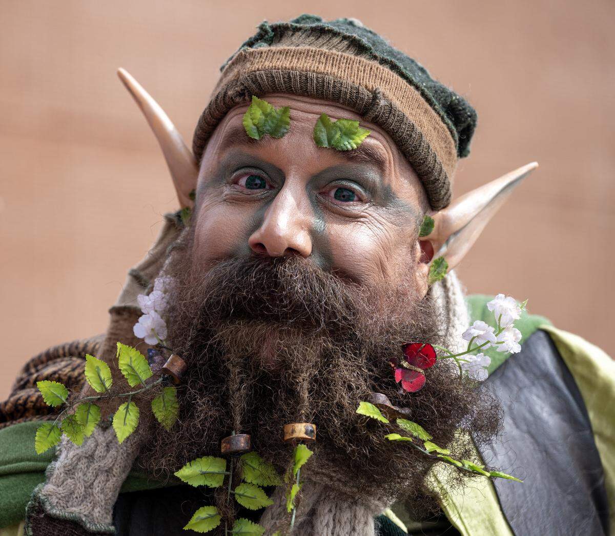 A participant from the Renaissance fair is seen dressed as an elf during the St. Patrick's Day parade along Broadway Boulevard on Tuesday, March 17, 2026, in Kansas City.