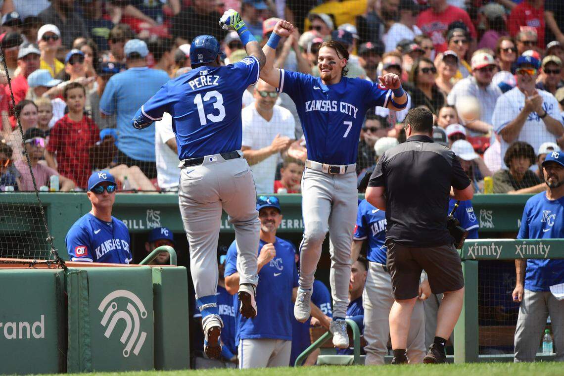 Kansas City Royals designated hitter Salvador Perez celebrates with shortstop Bobby Witt Jr. after hitting a home run during the sixth inning of Sunday’s game against the Boston Red Sox at Fenway Park.