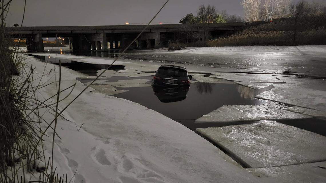This SUV slid into the Rouge River after a 17-year-old stopped on the banks because “he had to pee,” officials say.
