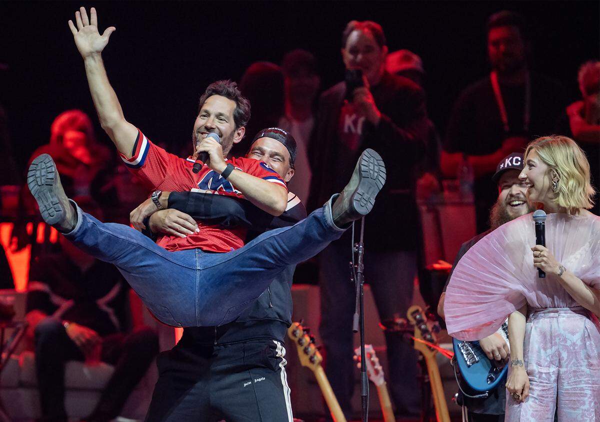 Chiefs tight end Travis Kelce lifts up Paul Rudd on stage at the Big Slick Show on Saturday, May 31, 2025, at the T-Mobile Center in Kansas City. The annual fundraiser and celeb-fest raised a record over $4 million at this year’s event. 