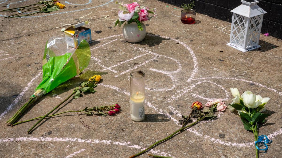 Messages written in chalk are seen on the sidewalk outside Klymax Lounge on Monday, May 22, 2023, in Kansas City. Three people were killed and two were injured in a shooting Sunday at the nightclub.
