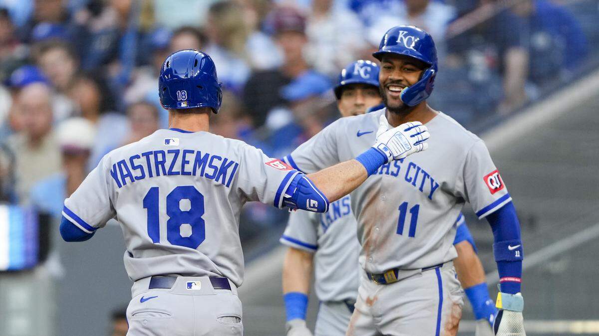 Kansas City Royals right fielder Mike Yastrzemski (18) with third baseman Maikel Garcia (11) after hitting a home run against the Toronto Blue Jays during the second inning at Rogers Centre on Aug. 1, 2025.