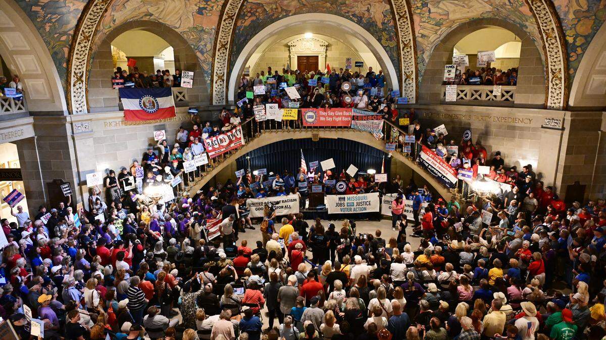 The rotunda of the Missouri statehouse in Jefferson City is packed with people on Wednesday, Sept. 10, 2025, protesting plans to redistrict congressional districts in the state.