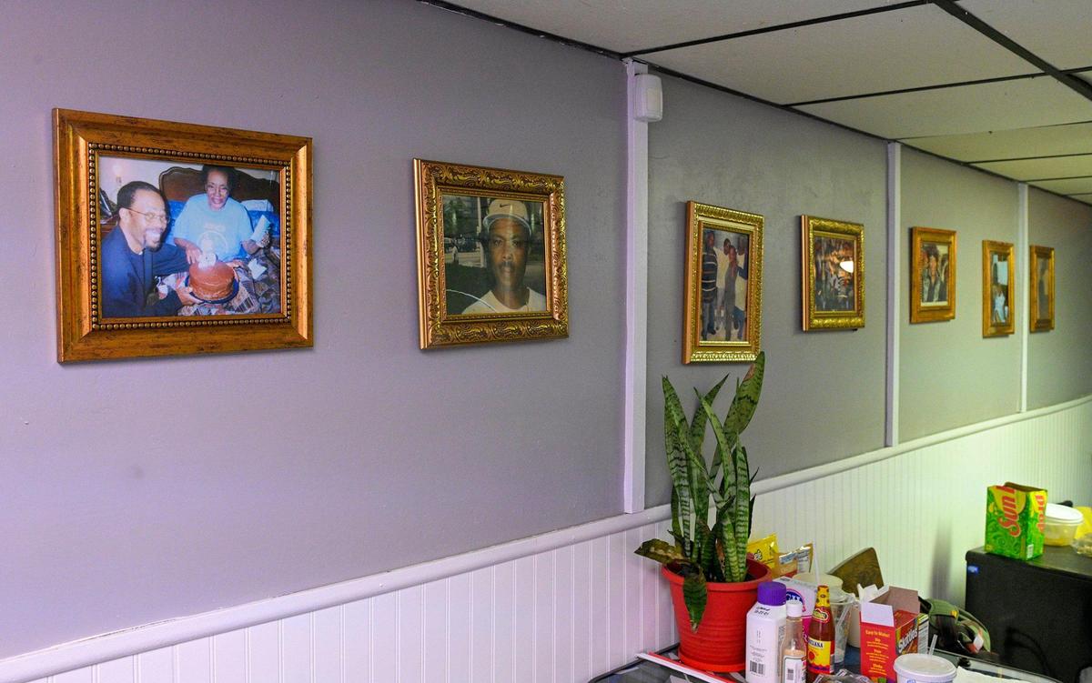 Family photos line a wall of Kevin Strickland’s basement room. He was denied the chance to attend his mother’s funeral three months before his release. Since then, he has been reconnecting with relatives.