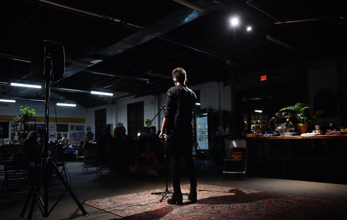 Zoe Dunning, 22, performs at a Poetic Underground event at Blip Roasters in the West Bottoms. Dunning says they underwent conversion therapy as a teen and now speaks out against the practice.
