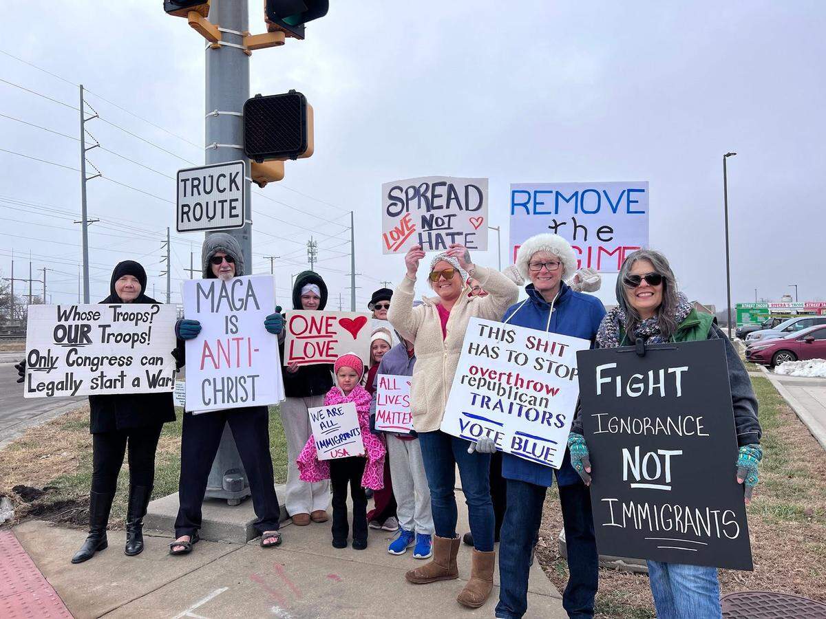Six months ago Gardner resident Aleksandra Nokes, far right, started a local group protesting current national events and policies. The group has continued to show up week after week.