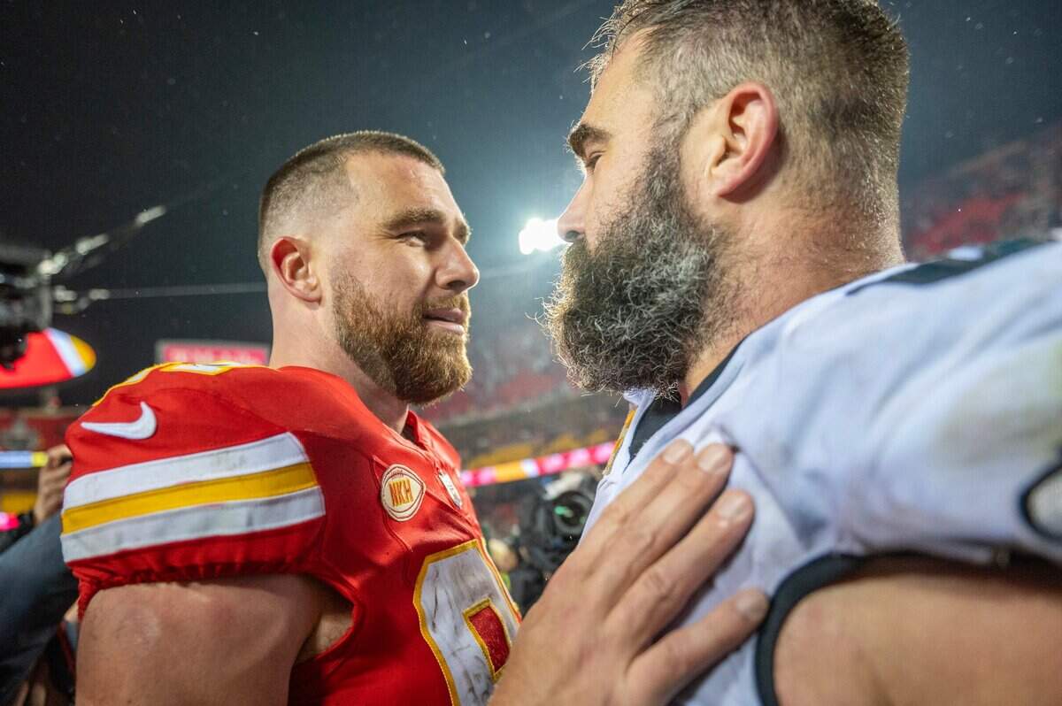 Travis Kelce and his brother, Philadelphia Eagles center Jason Kelce, meet on the field after the Eagles defeated the Chiefs at Arrowhead Stadium on Nov. 20, 2023. With Jason’s retirement at the end of the 2023 season, it was the last time the brothers would play each other in an NFL game.