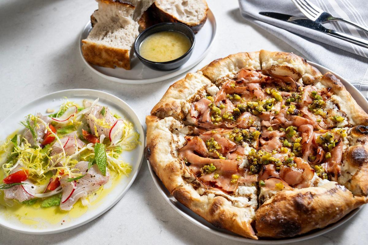 Some of Eric Stonestreet’s favorites at Osteria Bianchi: kanpachi crudo, focaccia with Parmesan salsa and Mortadella Pizza.