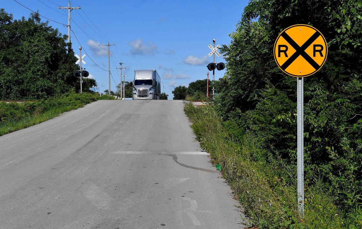 A freight train struck a tractor-trailer late last year in Cass County, killing the driver, Michael K. Samani of Lenexa. This photo shows the approach to the crossing on Anaconda Road, just east of East 255th Street on the southwest side of Harrisonville.
