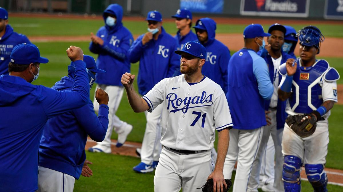 Royals closer Wade Davis (middle), came on in the top of the ninth inning to put away the Texas Rangers in the home opener at Kauffman Stadium on Thursday, April 1, 2021.